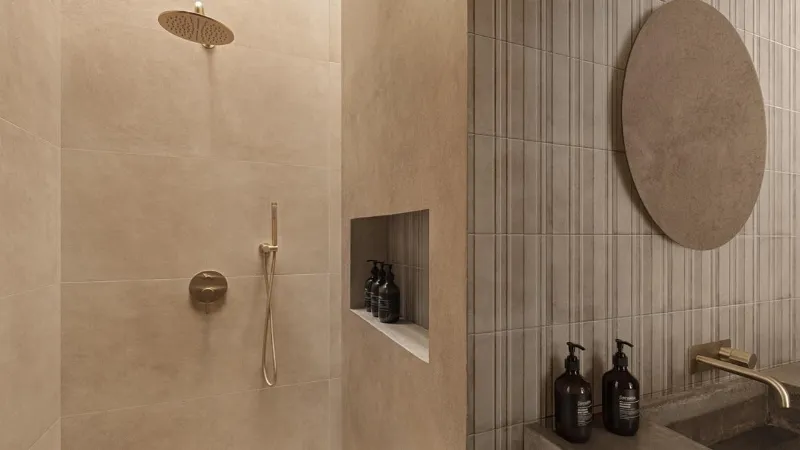 Rivestimento bagno realizzato con le collezioni Slow Coccio, ArtCraft Coccio e Sabbia