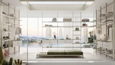 Cabina armadio Venere di Doal, montanti in alluminio si sposano con molteplici finiture in vetro