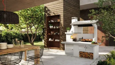 Trinidad di Palazzetti. Barbecue da giardino con porta legna integrato