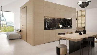 Il profilo nero identifica la porta filomuro Garofoli in Rovere Ice su boiserie in legno